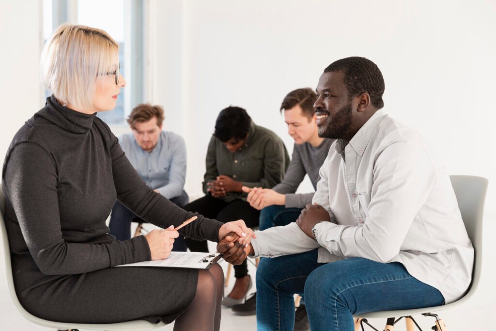 female doctor talking with afro american patient