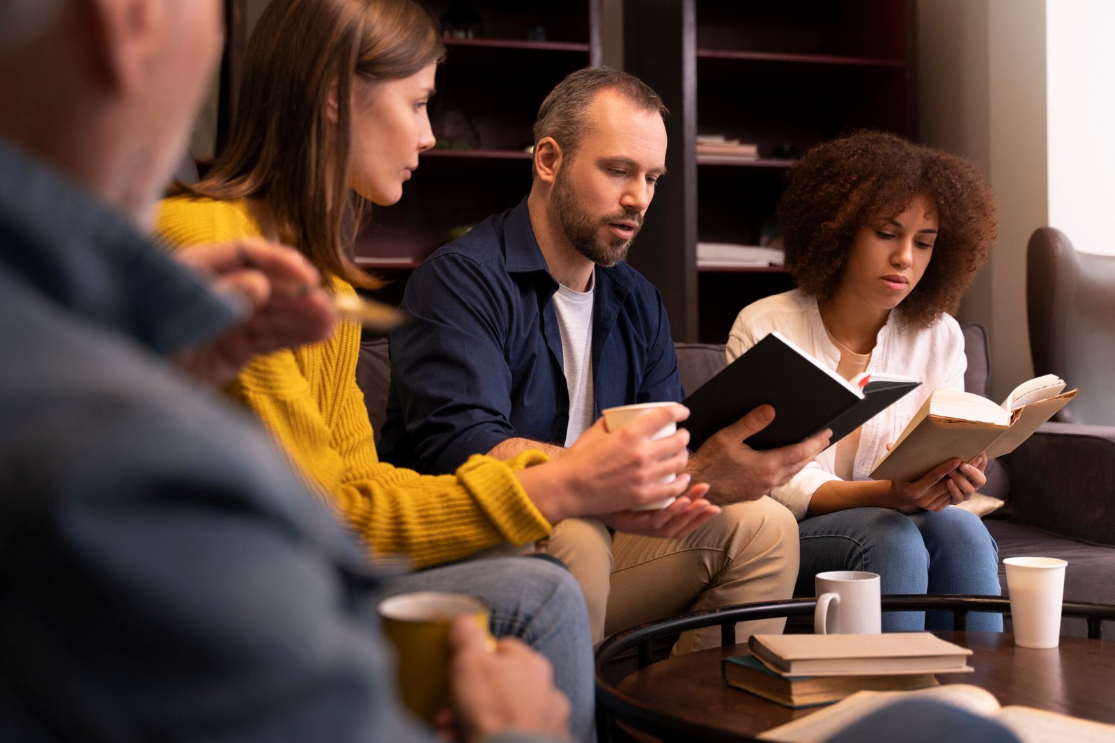 people reading together side view